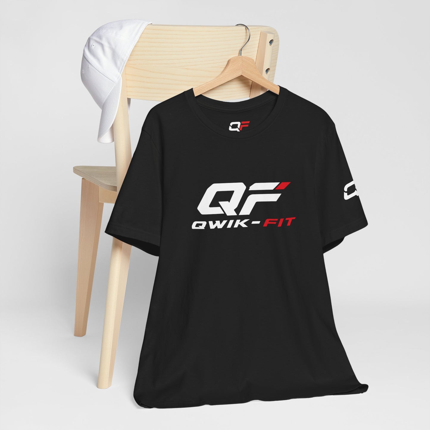 Qwik-Fit Logo Tee, a performance fitness short sleeve T-shirt by Printify, featuring the brand logo on a comfortable athletic shirt.