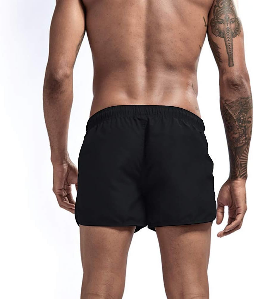 Men's black MICOZIFY gym workout shorts with 3-inch inseam, featuring zipper pockets, ideal for bodybuilding and running.