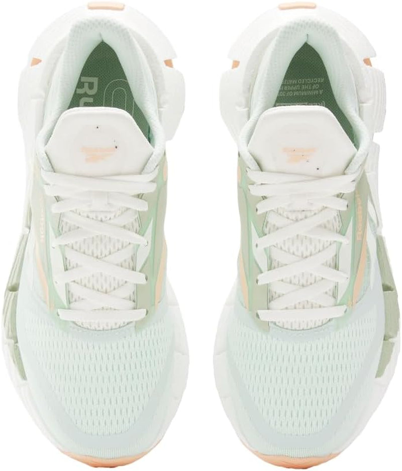Reebok women's Floatzig running shoes in vibrant colors with breathable mesh upper and cushioned sole for comfort and performance.