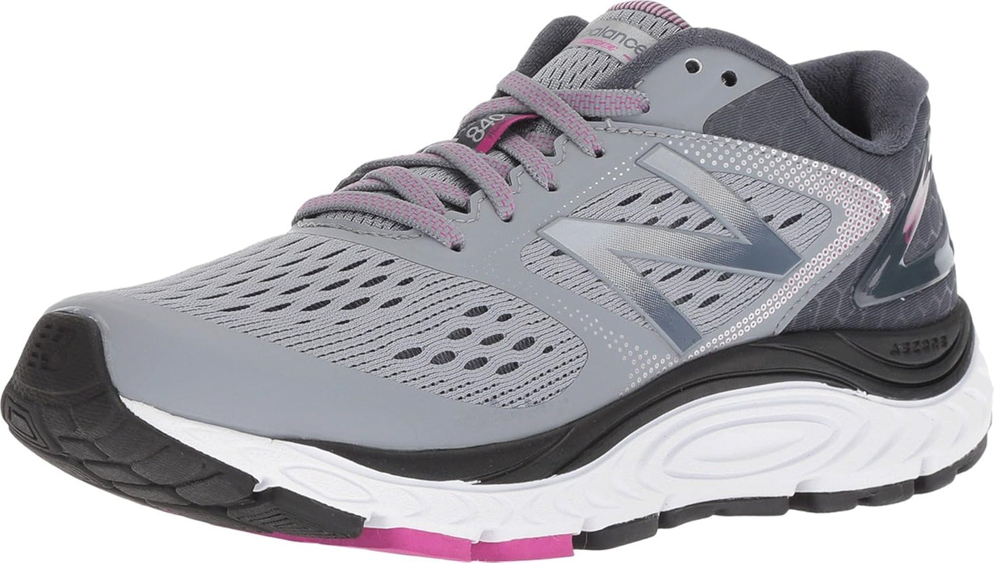 New Balance Women's 840 V4 running shoes in gray with white accents, featuring breathable mesh and supportive cushioning.
