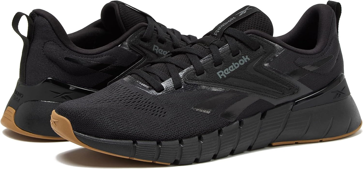 Reebok Nano Gym 1.0 men's athletic workout shoes with black and gray design, featuring durable sole and supportive fit.