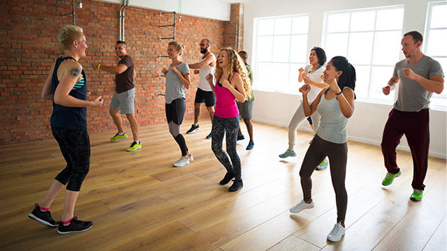 Group workout session highlighting the importance of leg day workouts for strength and fitness.