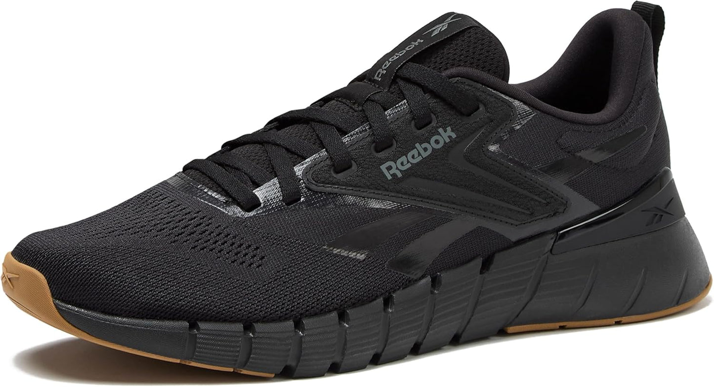 Reebok Nano Gym 1.0 men's athletic workout shoes with black and gray design, featuring supportive soles and breathable mesh material.