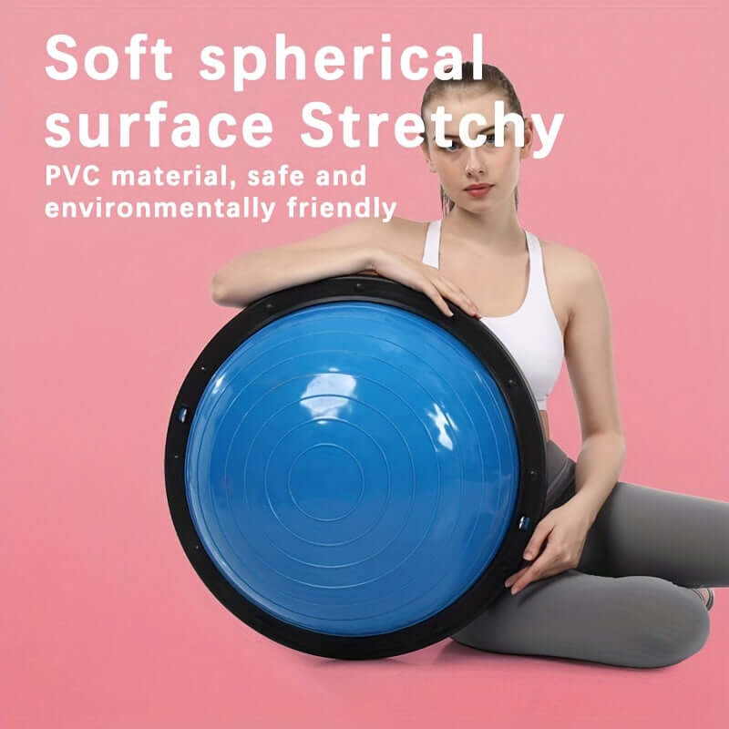 Woman holding a blue flameproof balance ball for adults, made of PVC material, designed for effective workouts.