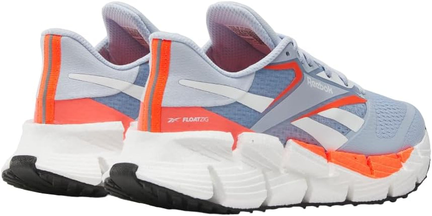 Reebok women's Floatzig running shoes in vibrant colors with breathable mesh uppers and cushioned soles for comfort.