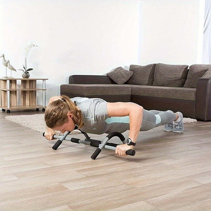 Person using a doorway stretch trainer for push-ups at home, demonstrating practical exercise routine.