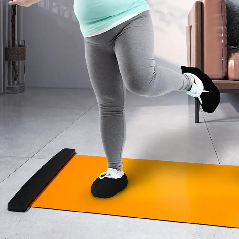 Person using a multifunctional exercise running mat for core training during a leg workout at home.