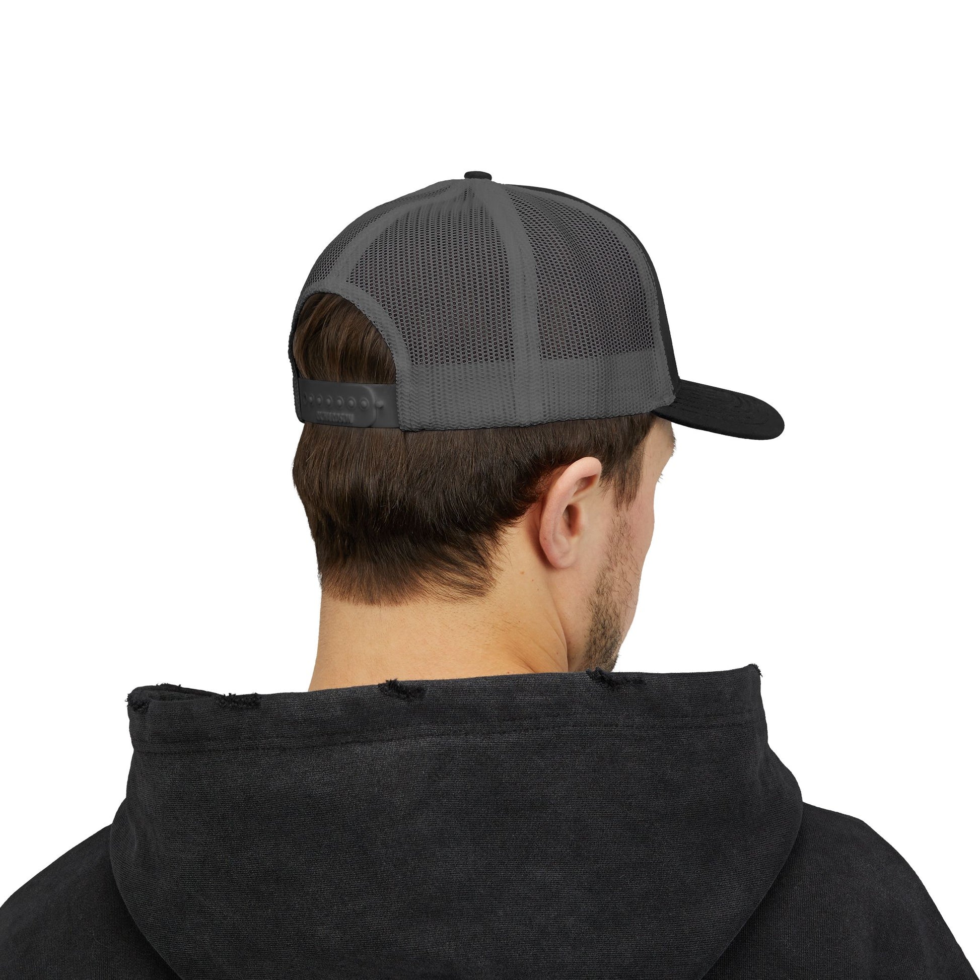 Distressed red and white emblem snapback trucker hat by Printify with bold logo and adjustable mesh back.