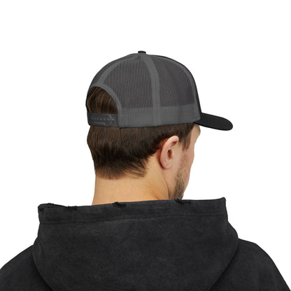 Distressed red and white emblem snapback trucker hat by Printify with bold logo and adjustable mesh back.