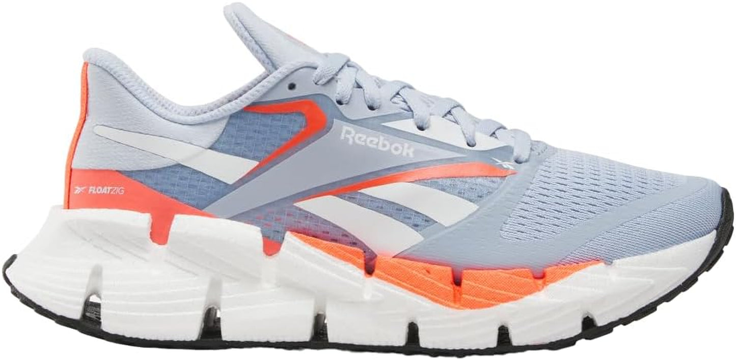 Reebok women's Floatzig running shoes in vibrant color, featuring breathable mesh and cushioned soles for comfortable running.