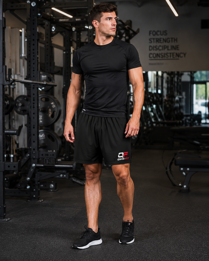 All-over print Qwik-Fit men's athletic shorts with breathable fabric and logo, featuring vibrant sports-inspired design.