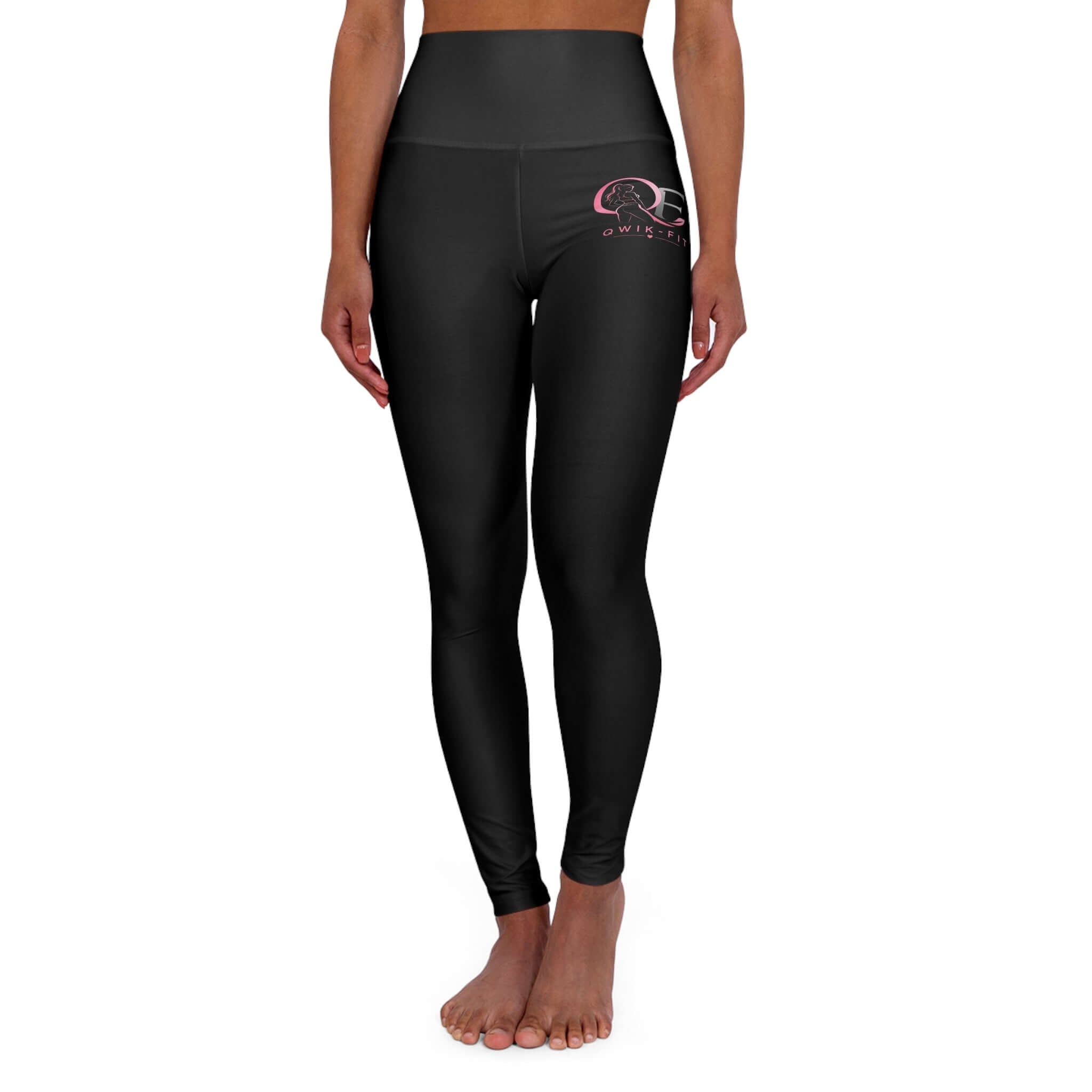 Model wearing Qwik-Fit high-waisted yoga leggings, perfect for workouts and casual wear.