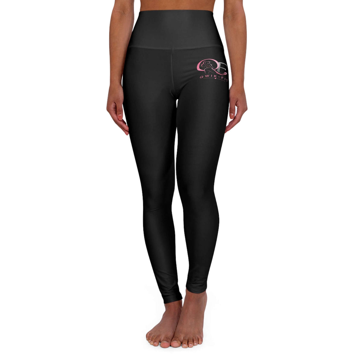 Model wearing Qwik-Fit high-waisted yoga leggings, perfect for workouts and casual wear.