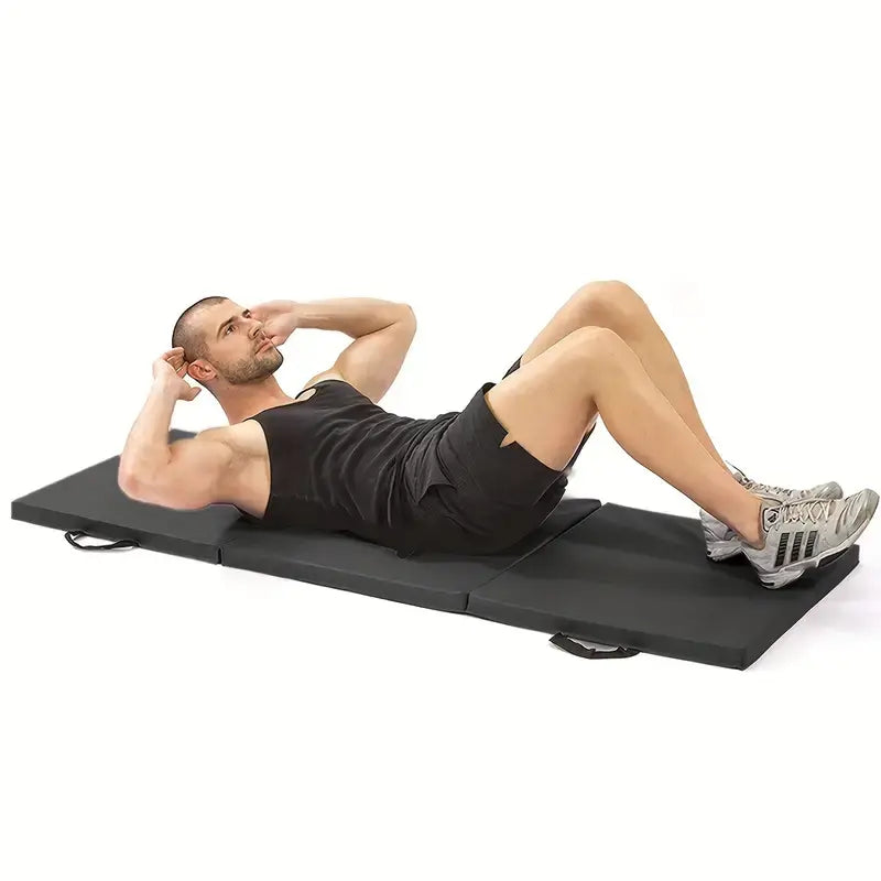 Man performing crunches on an anti-tear balance mat for effective home workouts.