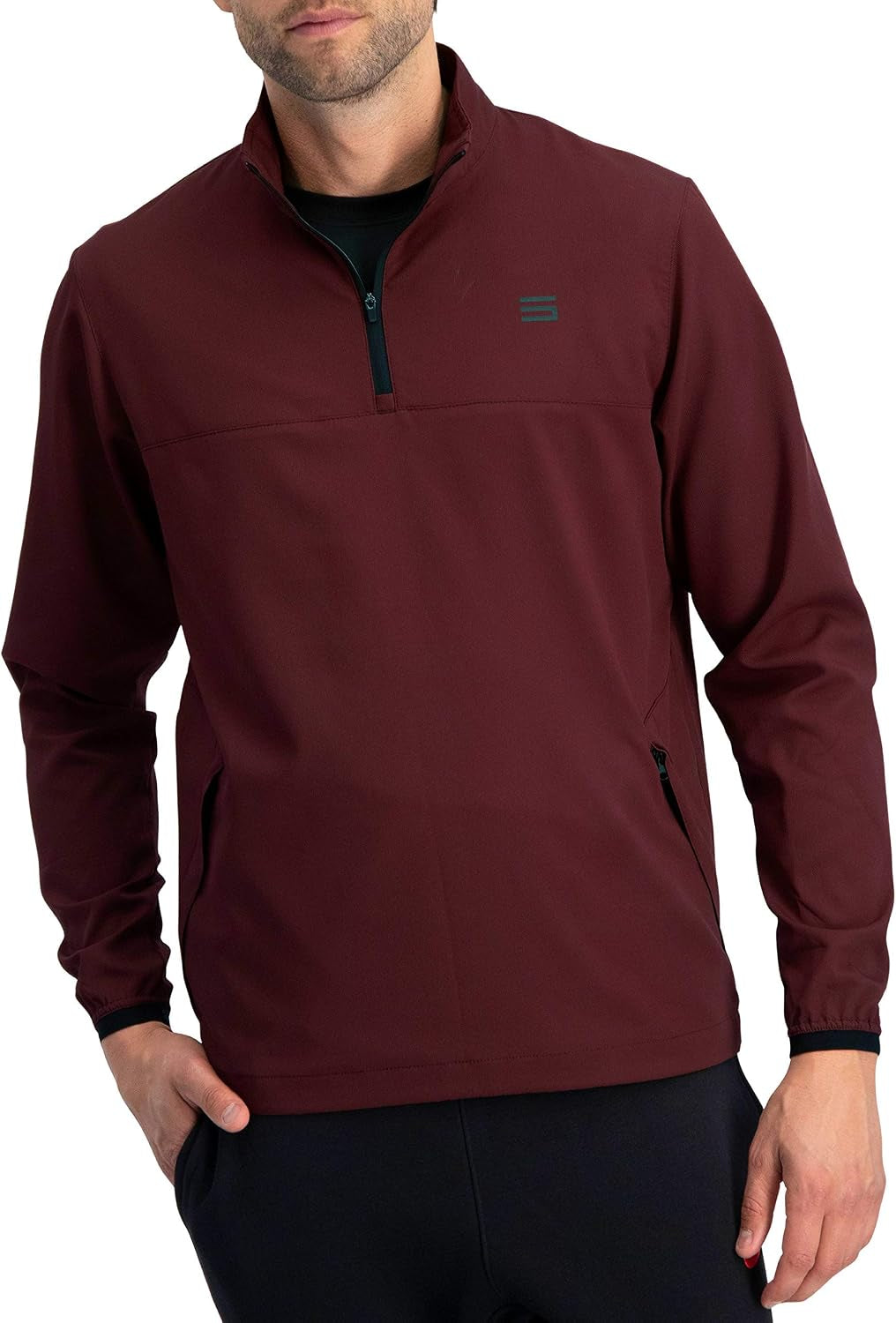 Men's Three Sixty Six windbreaker jacket with zippered front, vented design, and dry fit fabric for golf and outdoor activities.