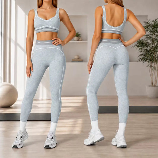 Breathable buttery soft seamless yoga bra and hip shaping leggings in a contrast stripe trim sport two-piece activewear set.