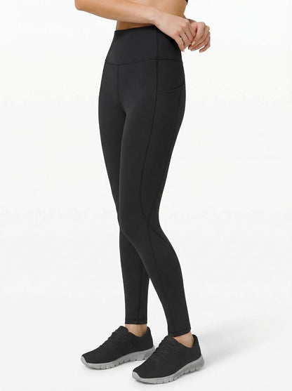 Black high waist PHISOCKAT yoga pants for women with pockets, tummy control, and stretchy leggings for workout and casual wear.