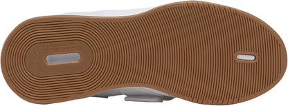 Reebok Legacy Lifter III weightlifting shoes with black and white design, featuring sturdy heel and supportive straps for training.