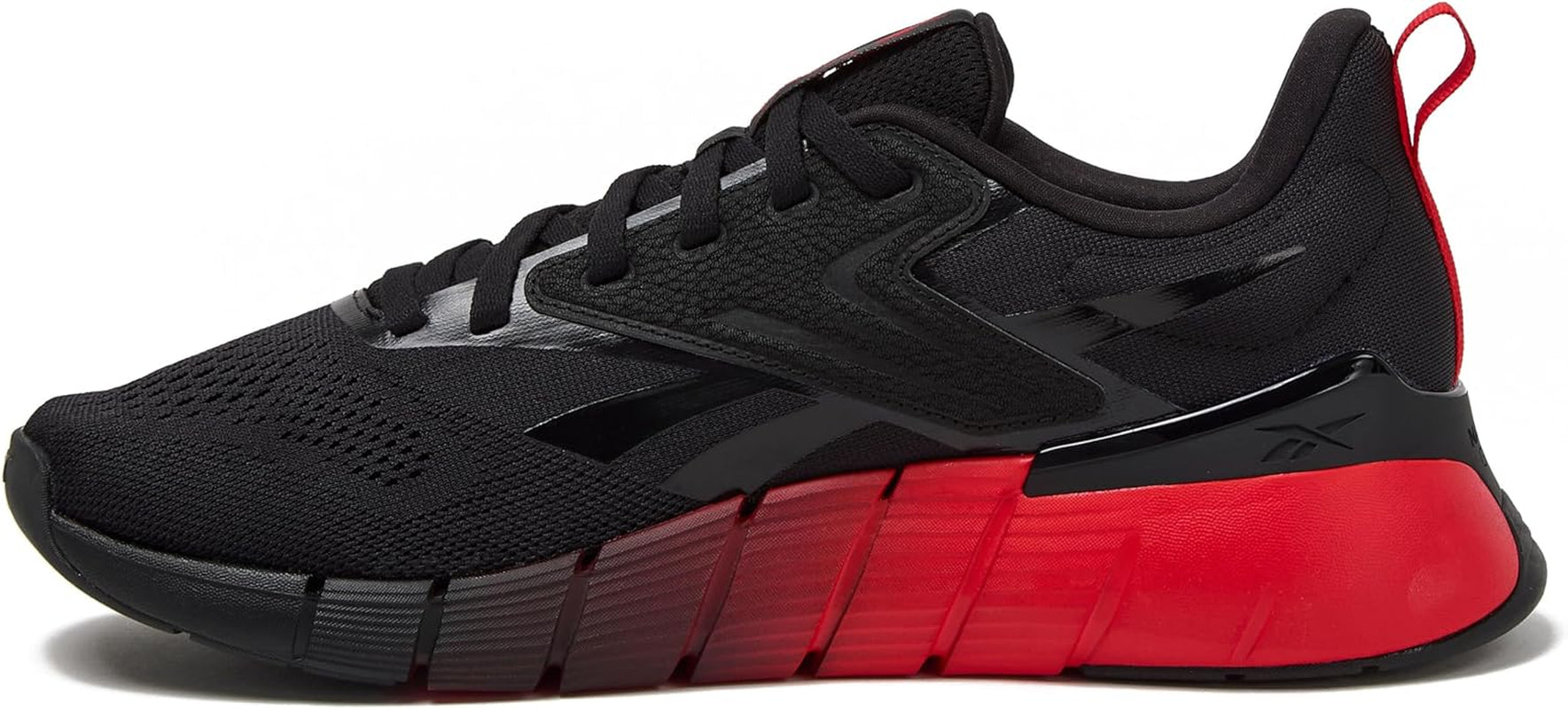 Reebok Nano Gym 1.0 men's athletic workout shoes with black and gray design, rubber soles, and supportive fit.