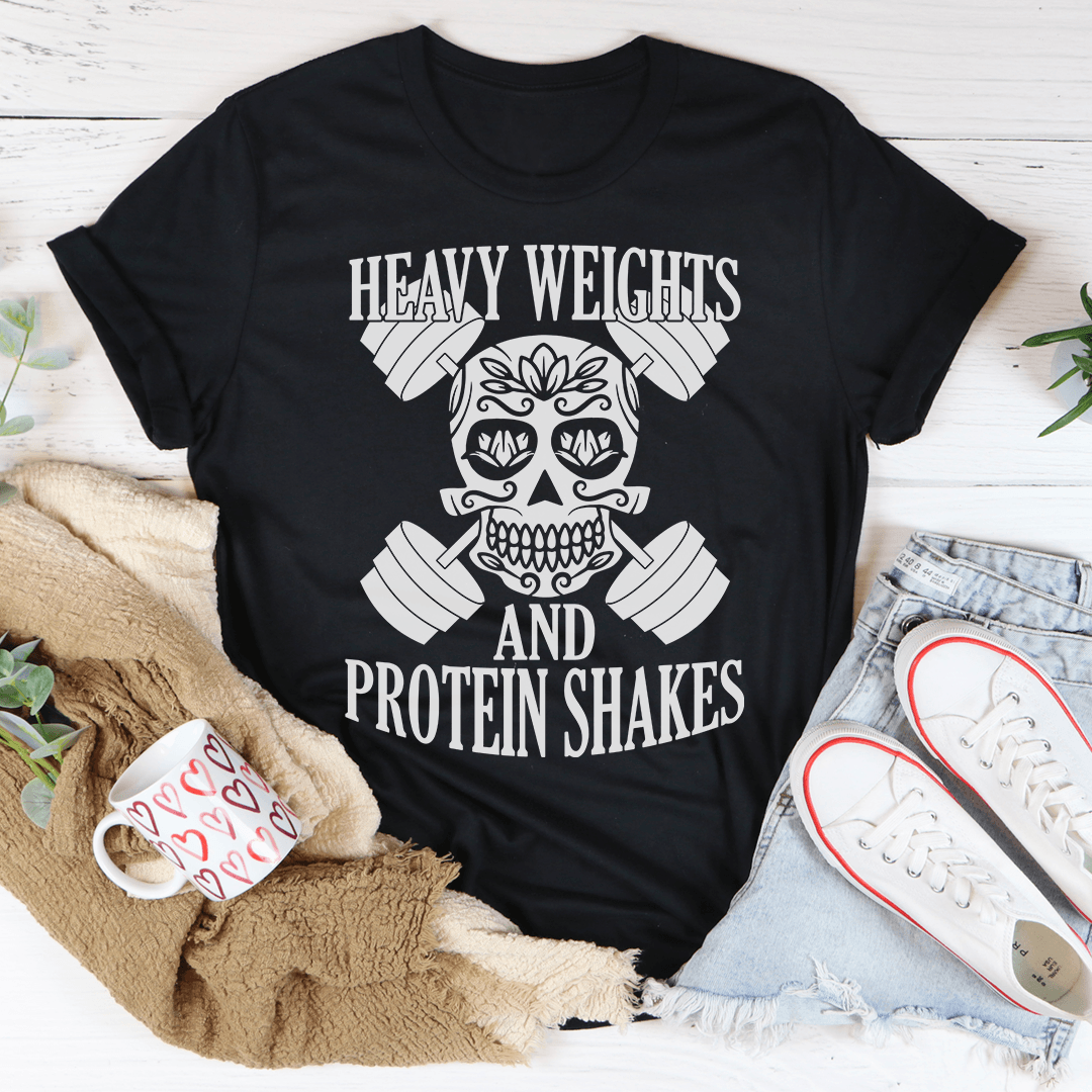 Heavy Weights Protein Shakes Tee in black featuring a skull and dumbbells design, perfect for workouts and casual wear.