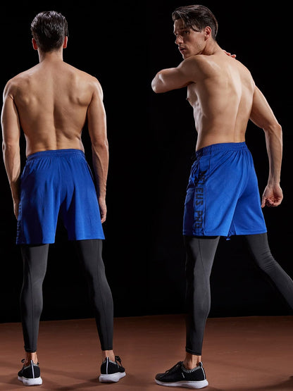 Men's NELEUS lightweight athletic shorts with pockets, designed for workout and active wear, shown in a casual pose.
