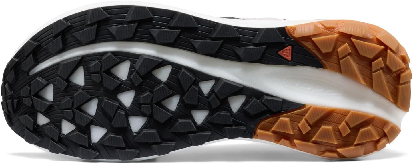 KEEN Seek trail running shoes in black with orange accents, featuring durable soles and breathable mesh uppers.