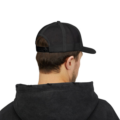 Red and white distressed emblem trucker cap with snapback closure, featuring a bold logo design, by Printify.