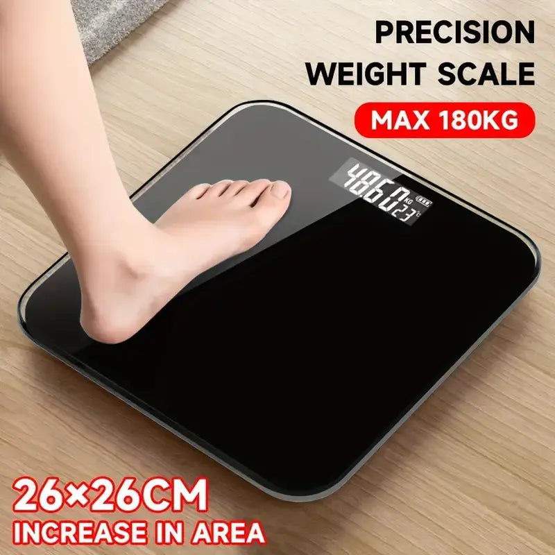 High precision battery powered body weight scale showing a reading on its digital display with a foot on it.