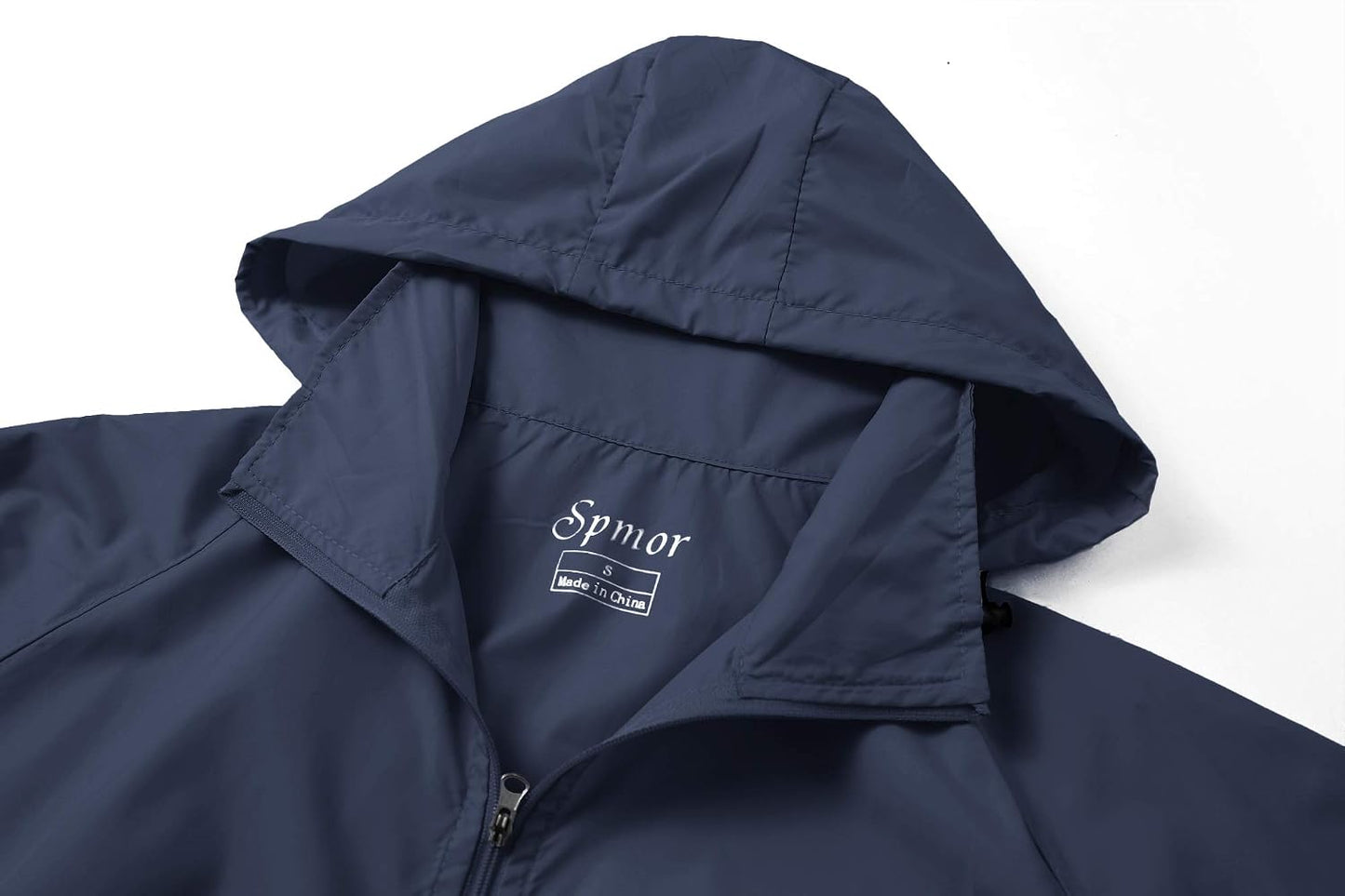 Women’s lightweight waterproof jacket by Spmor, packable windbreaker coat ideal for running and outdoor activities.