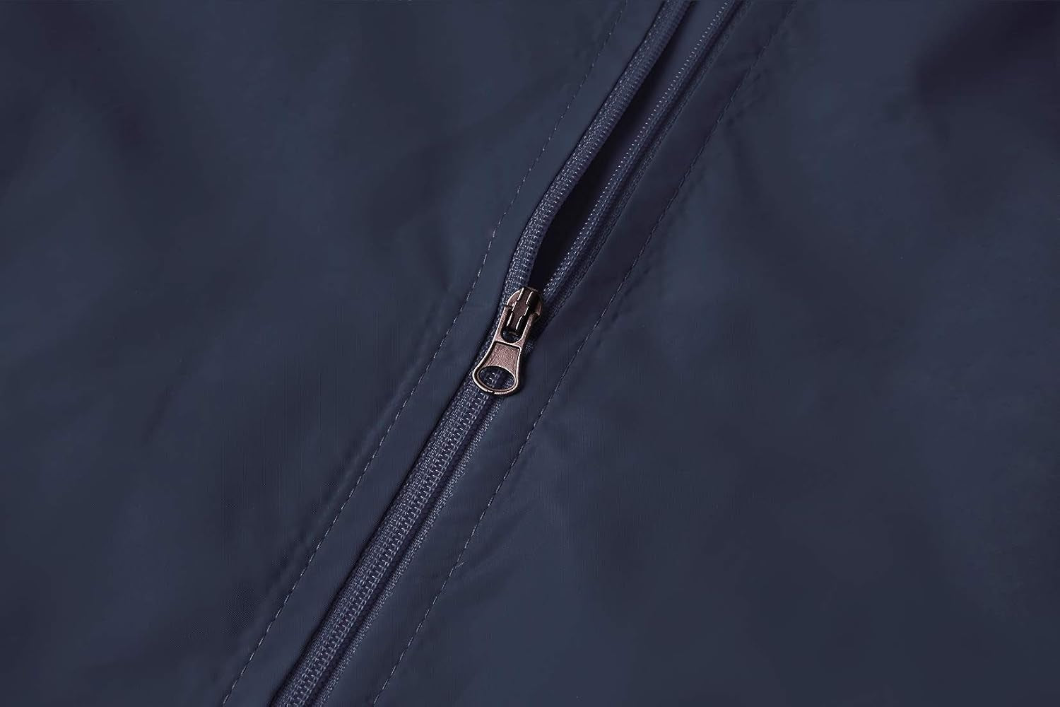 Women's lightweight waterproof jacket by Spmor, packable windbreaker and running coat for outdoor activities.