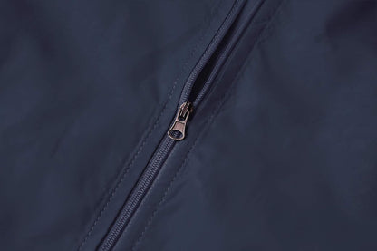 Women's lightweight waterproof jacket by Spmor, packable windbreaker and running coat for outdoor activities.