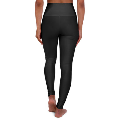 High waisted yoga leggings in black viewed from the back, showcasing comfort and style for workouts and casual wear.
