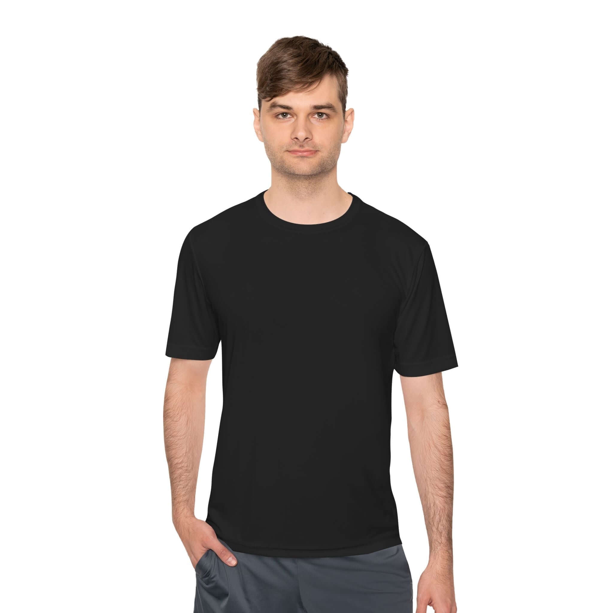 Man wearing a black moisture-wicking gym shirt, perfect for workouts and casual wear.