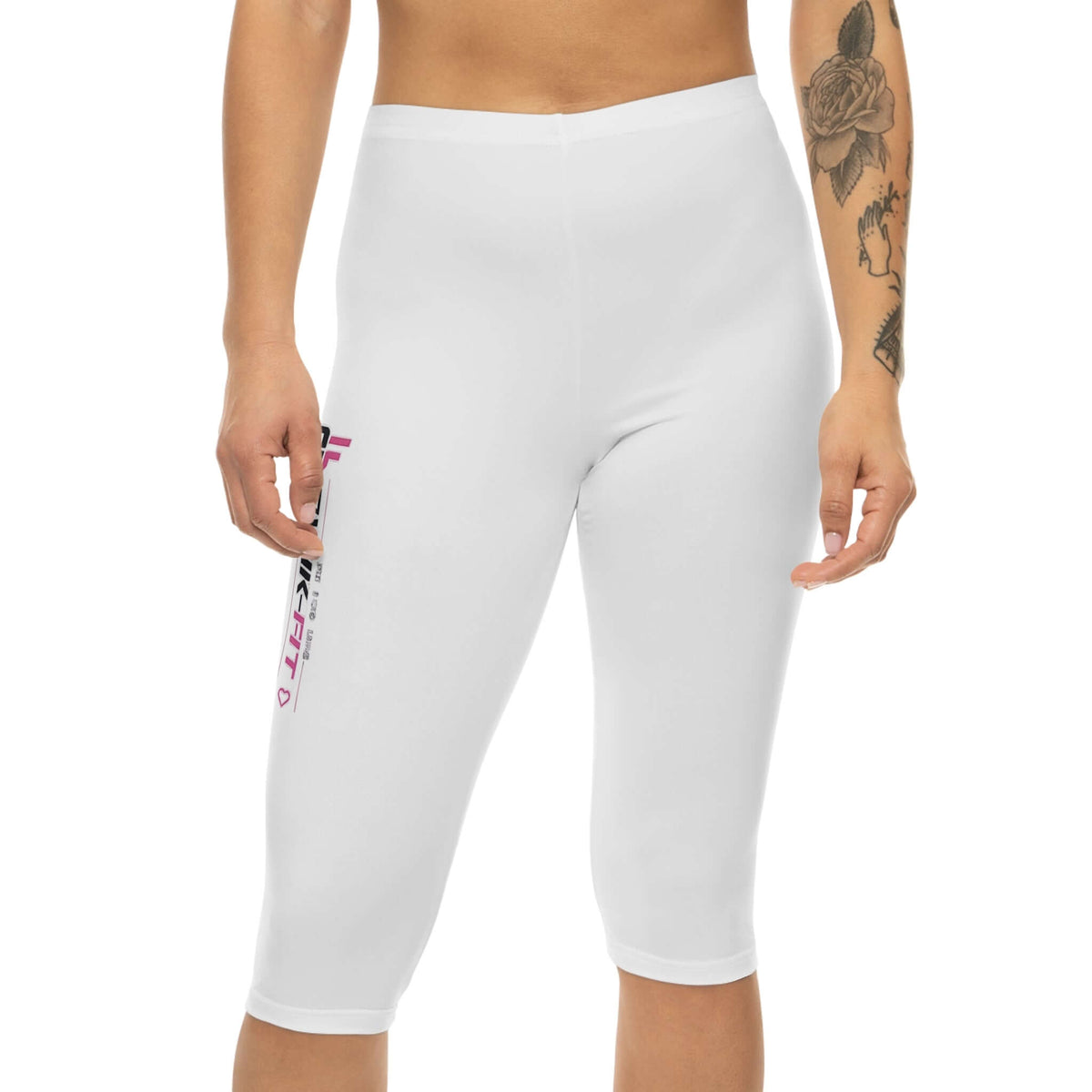 Women's White Athletic Capri Leggings with side logo, perfect for yoga and gym workouts.