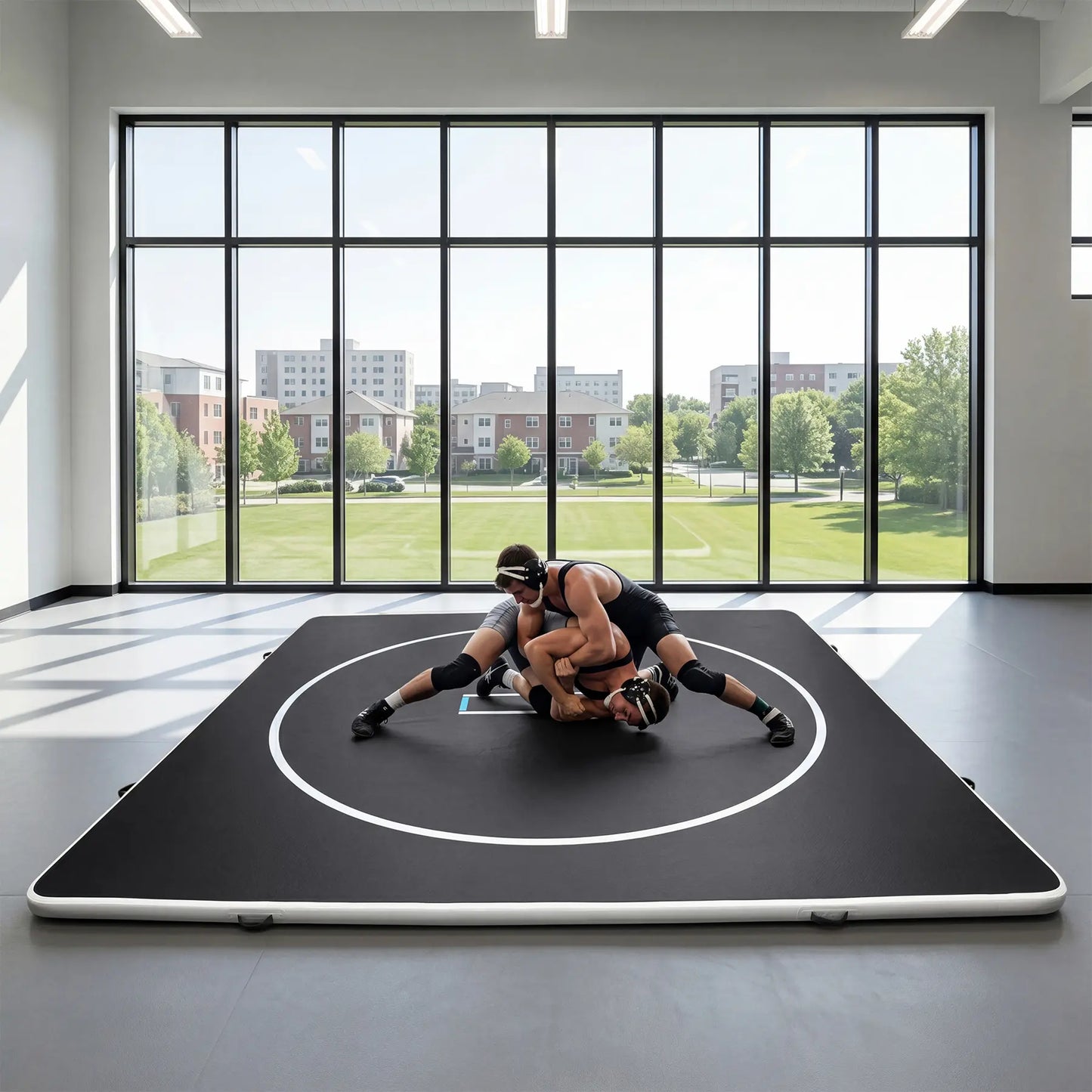 Inflatable wrestling mat in blue, 10ft or 13ft size, 4-inch thick PVC surface with circles, suitable for martial arts and home training.