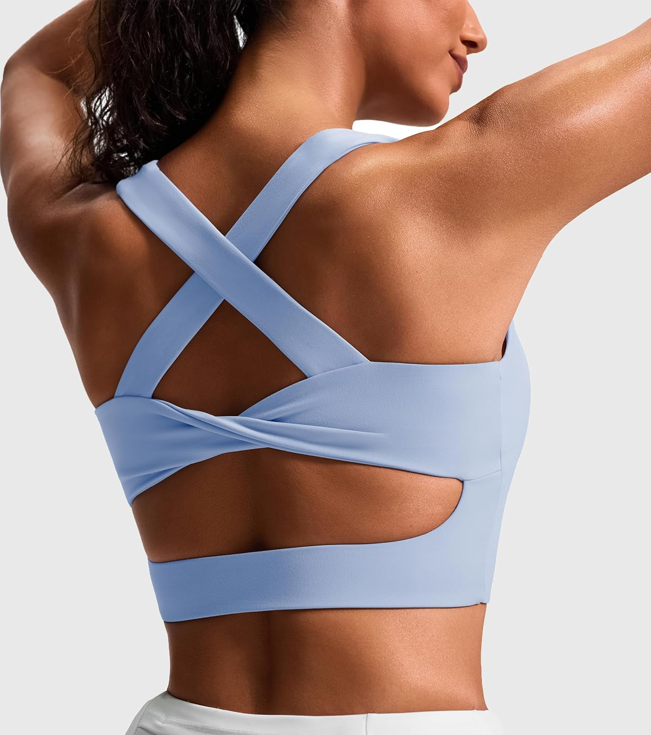 JOYSPELS women's criss-cross back padded sports bra, medium support workout tank top, ideal for exercise and active wear.