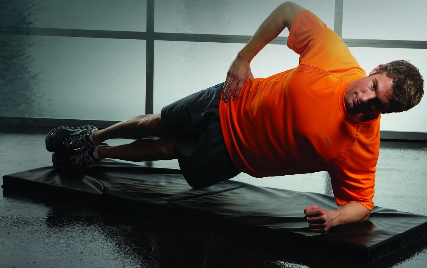 SPRI exercise bi-fold fitness mat in 60 or 72 inches, showing the padded, foldable design ideal for workout and yoga routines.