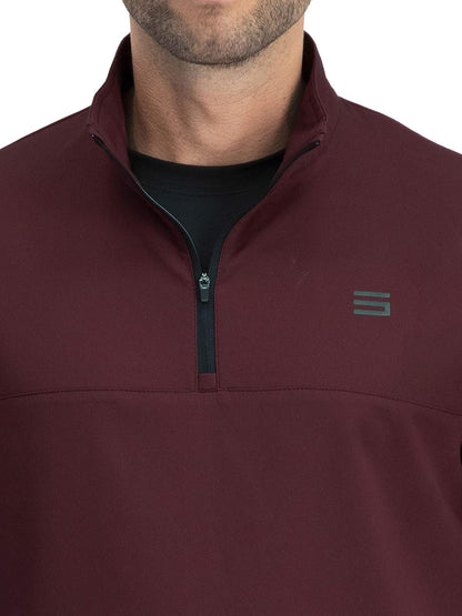 Men's Three Sixty Six windbreaker jacket with zippered front, vented design, and dry fit material for golf or outdoor activities.