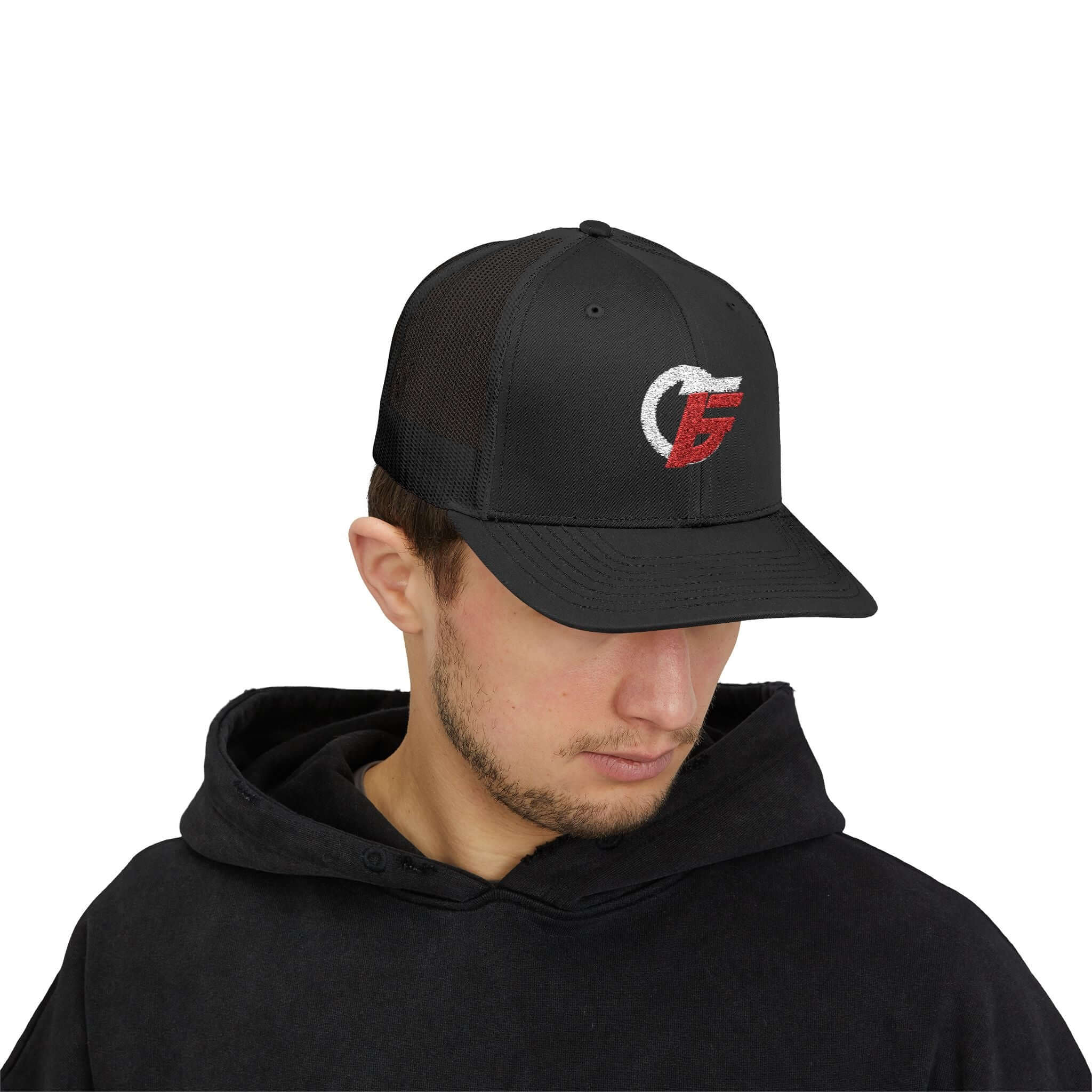 Emblem Trucker Cap in black featuring a distressed red and white trucker cap logo, ideal for active routines.
