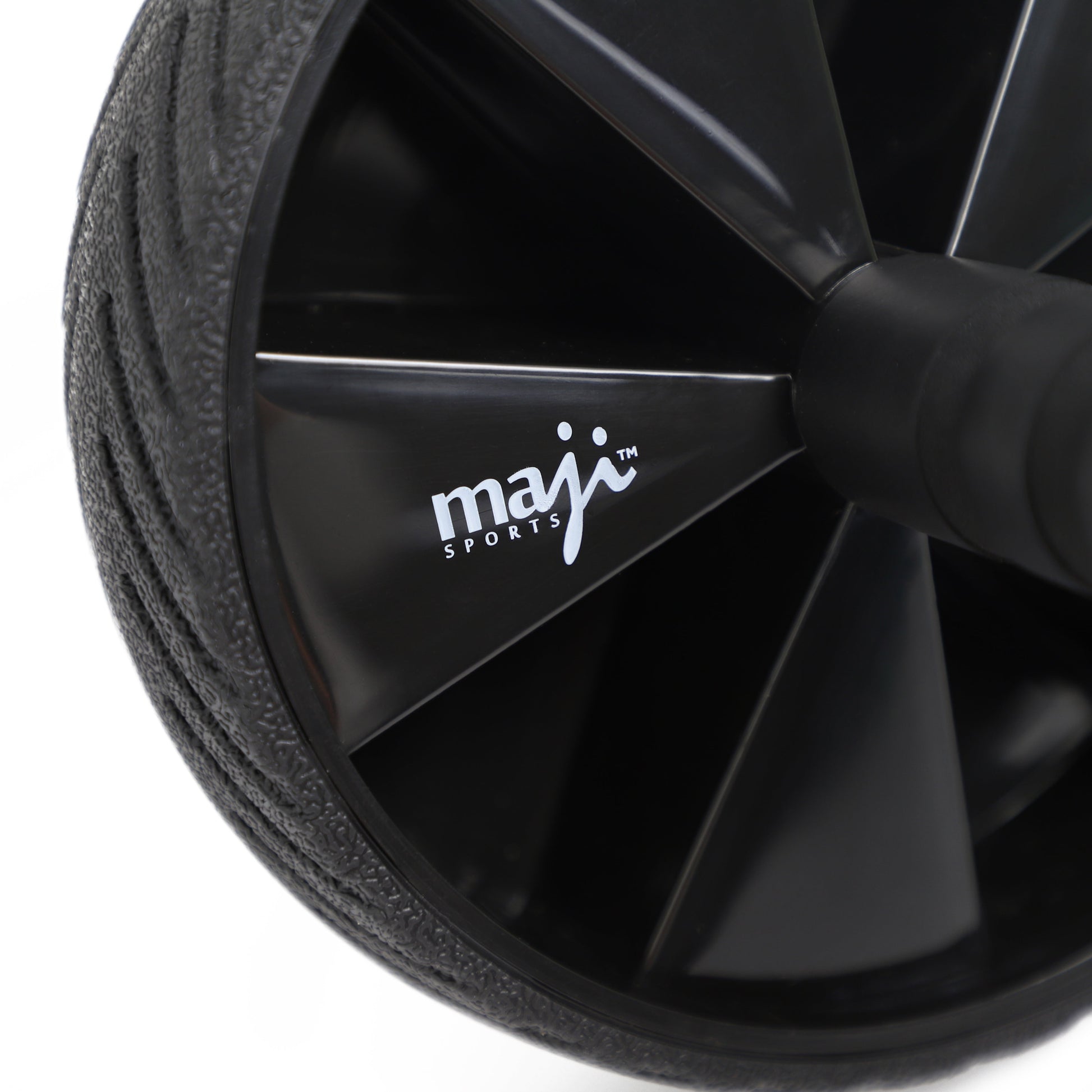 Maji Sports core training ab wheel close-up showing design and branding for effective workouts.