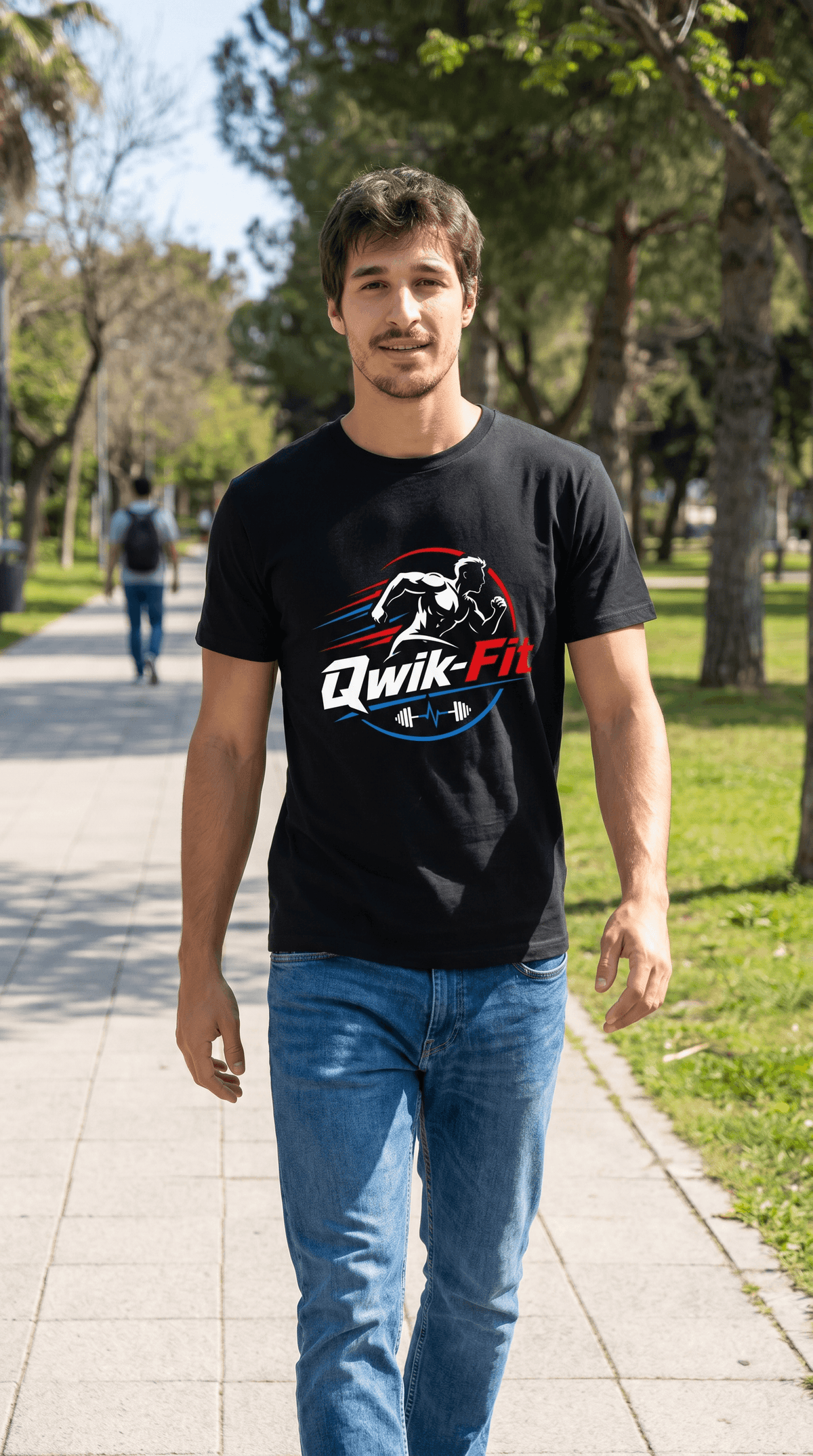 Man wearing a black Qwik-Fit V-Neck Workout T-Shirt while walking in a park, perfect for workouts and casual outings.