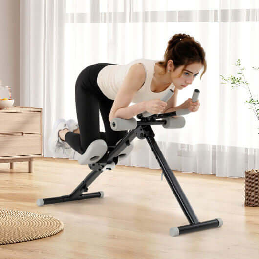 Woman using adjustable ab workout machine for effective home workouts in a bright and spacious room.