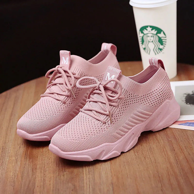 women's casual sports sneakers in pink, breathable mesh upper, lightweight running and walking shoes.