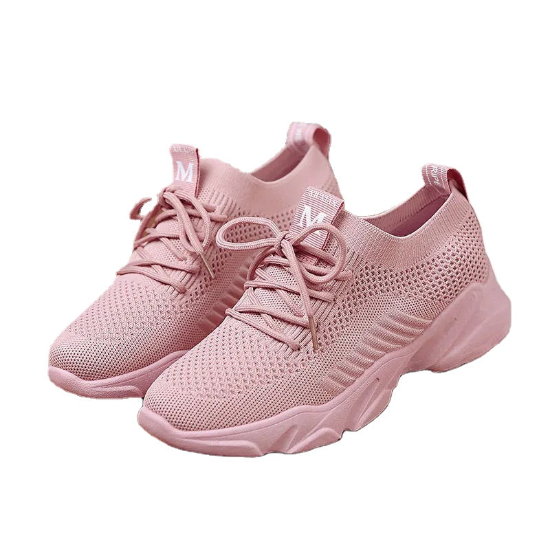 Stylish pink women's casual sports sneakers with breathable mesh for running and walking.
