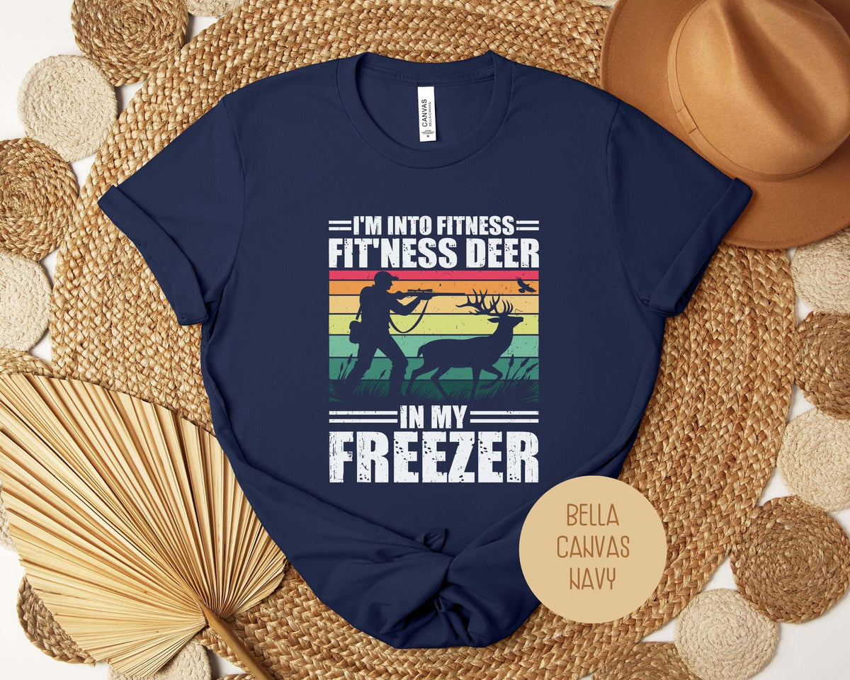 Funny hunting fitness shirt featuring a deer graphic on a navy blue t-shirt, styled for casual and athletic uses.