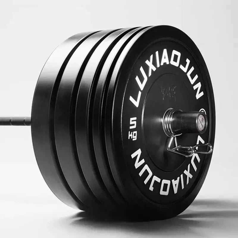 Black rubber barbell plates 150kg stacked on a barbell, ideal for home and gym workouts.
