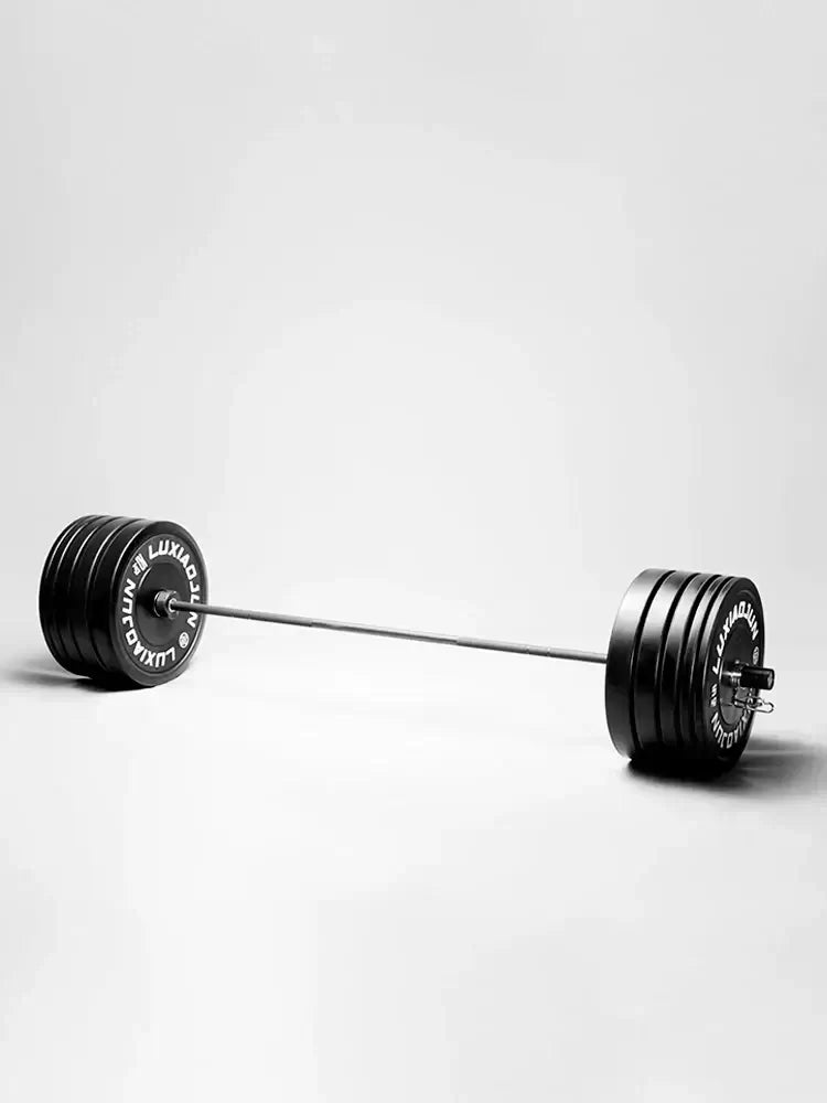 D Series Black Rubber Barbell Plates (150Kg) on a barbell for effective home workouts and gym sessions.