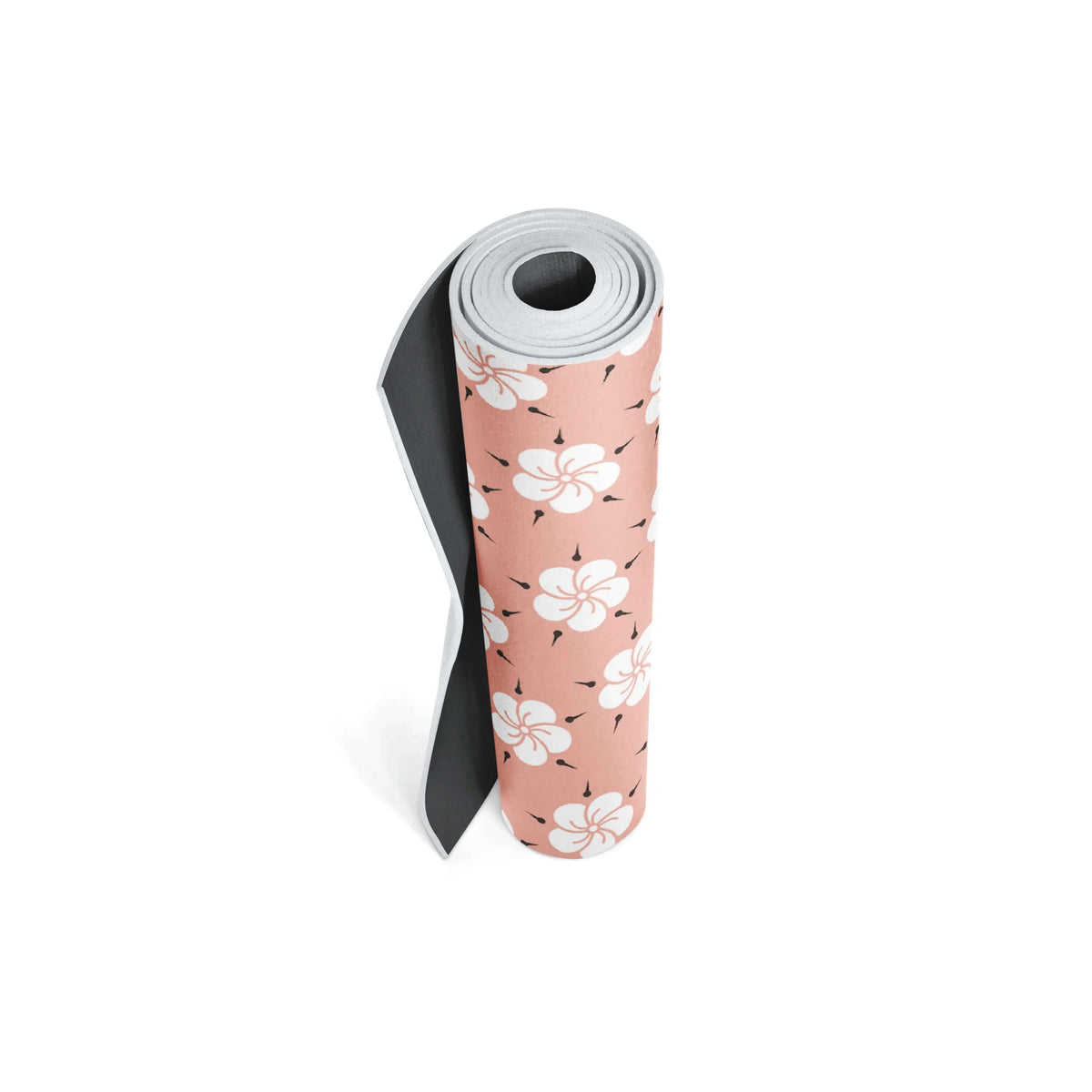 Kumiko Yoga Mat in tan with floral design, 6mm non-slip, eco-friendly non-slip yoga mat, rolled up for easy storage.