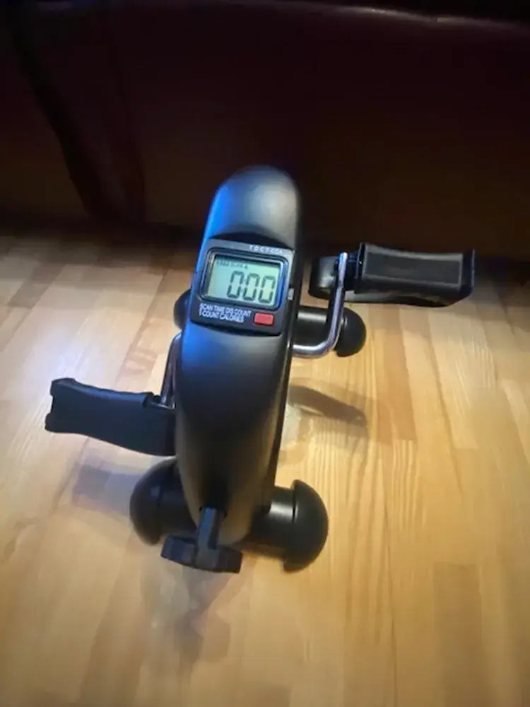 Home gym mini pedal stepper for effective workouts at home or gym, featuring adjustable resistance and a digital display.
