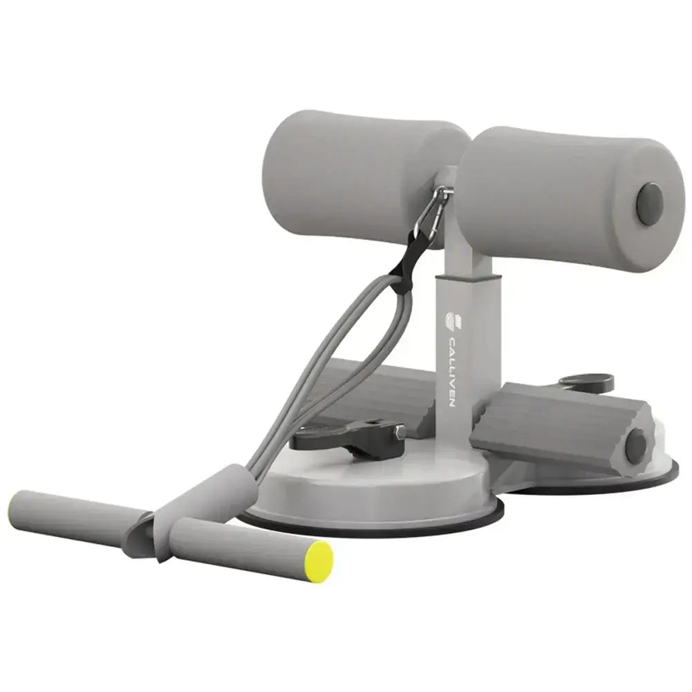 Muscle training aid with suction cups in gray, featuring handles and workout bands for effective home fitness routines.